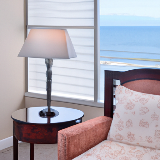 An interior shot of a hotel room with an ocean view, displaying the opulence and attention to detail in design.